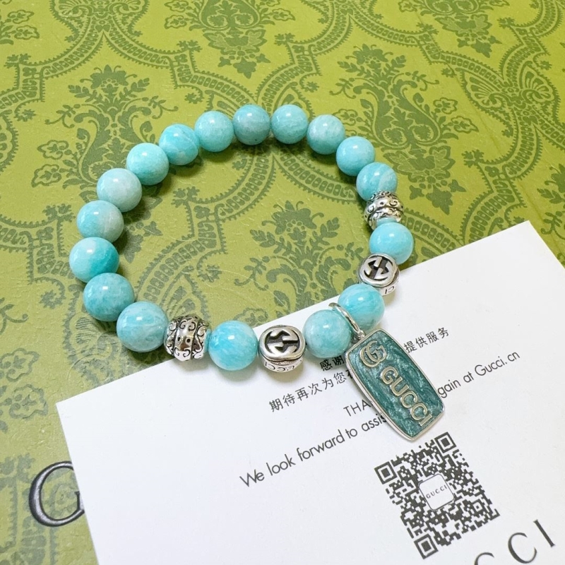 G*u*i bracelets